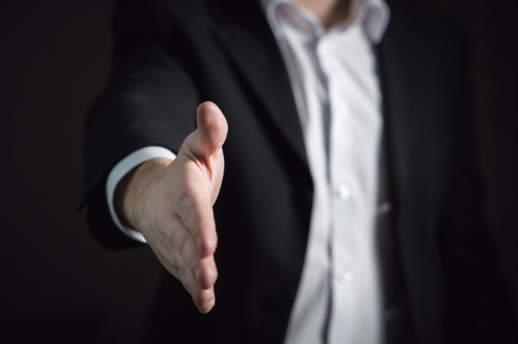 man offering a hand shake